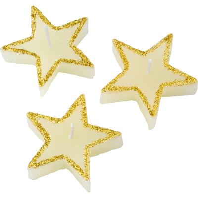 Image of Three star-shaped candles